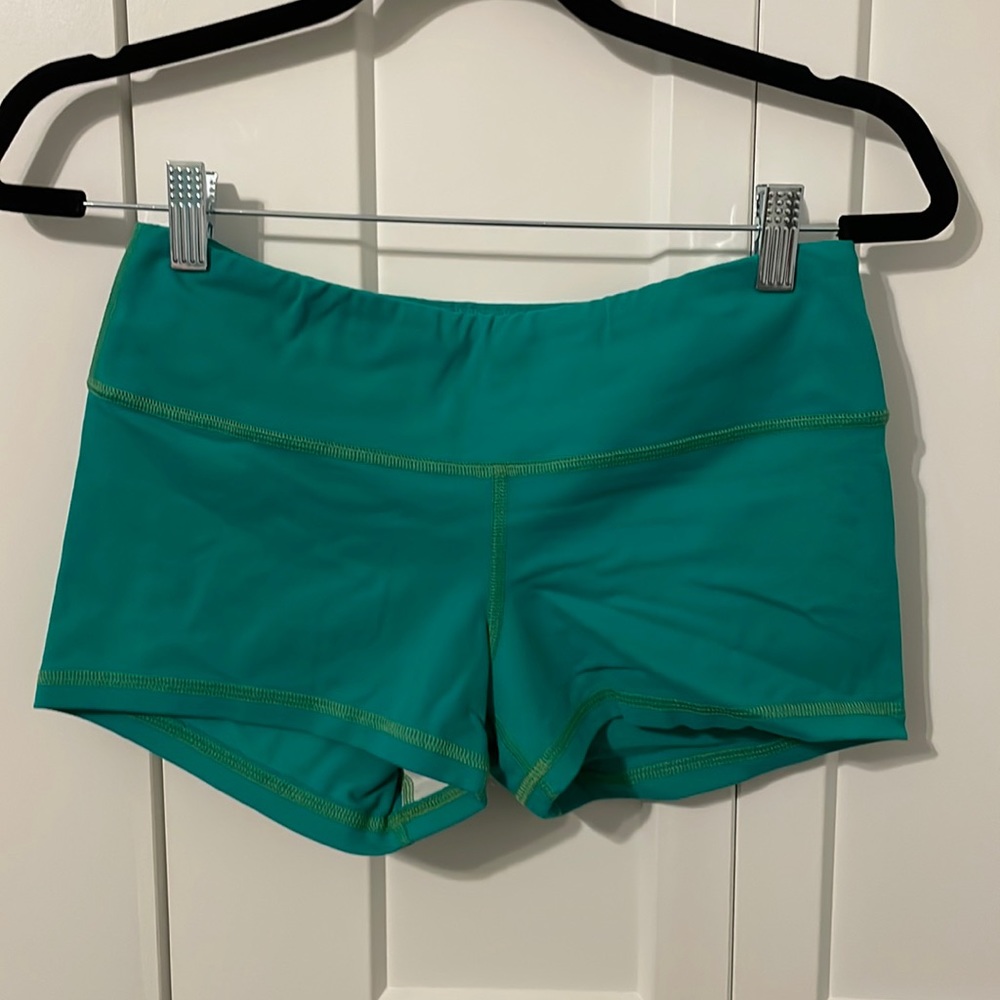 Green FLEO workout shorts size M